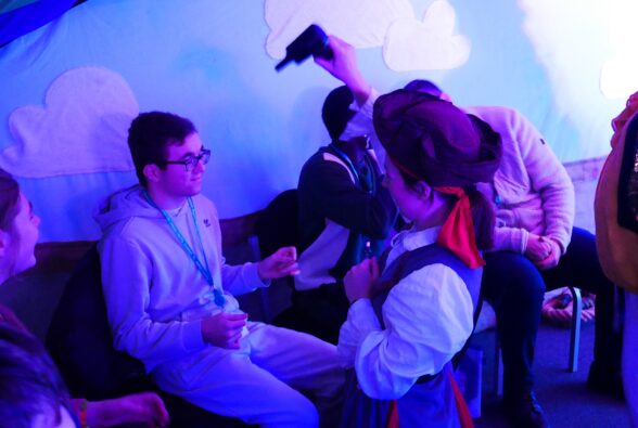 Bobby Iles, Skills for Living student feels the effect of a sensory offer with Caroline O'Mahoney, 7Sense Performer at Make/Sense Theatre.